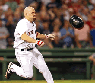 kevin+youkilis+red+sox+brawl+charging+mound+helmet.gif