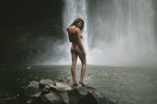 5426265-woman-female-swimsuit-waterfall-lake-splash-spray-mist-rock-bikini-grass-paradise-trop...jpg