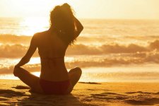 woman-girl-sitting-sunrise-sunset-bikini-beach-darren-baker.jpg